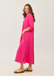 Fuchsia dress with a partial button placket and square pockets