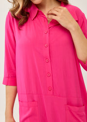 Fuchsia dress with a partial button placket and square pockets