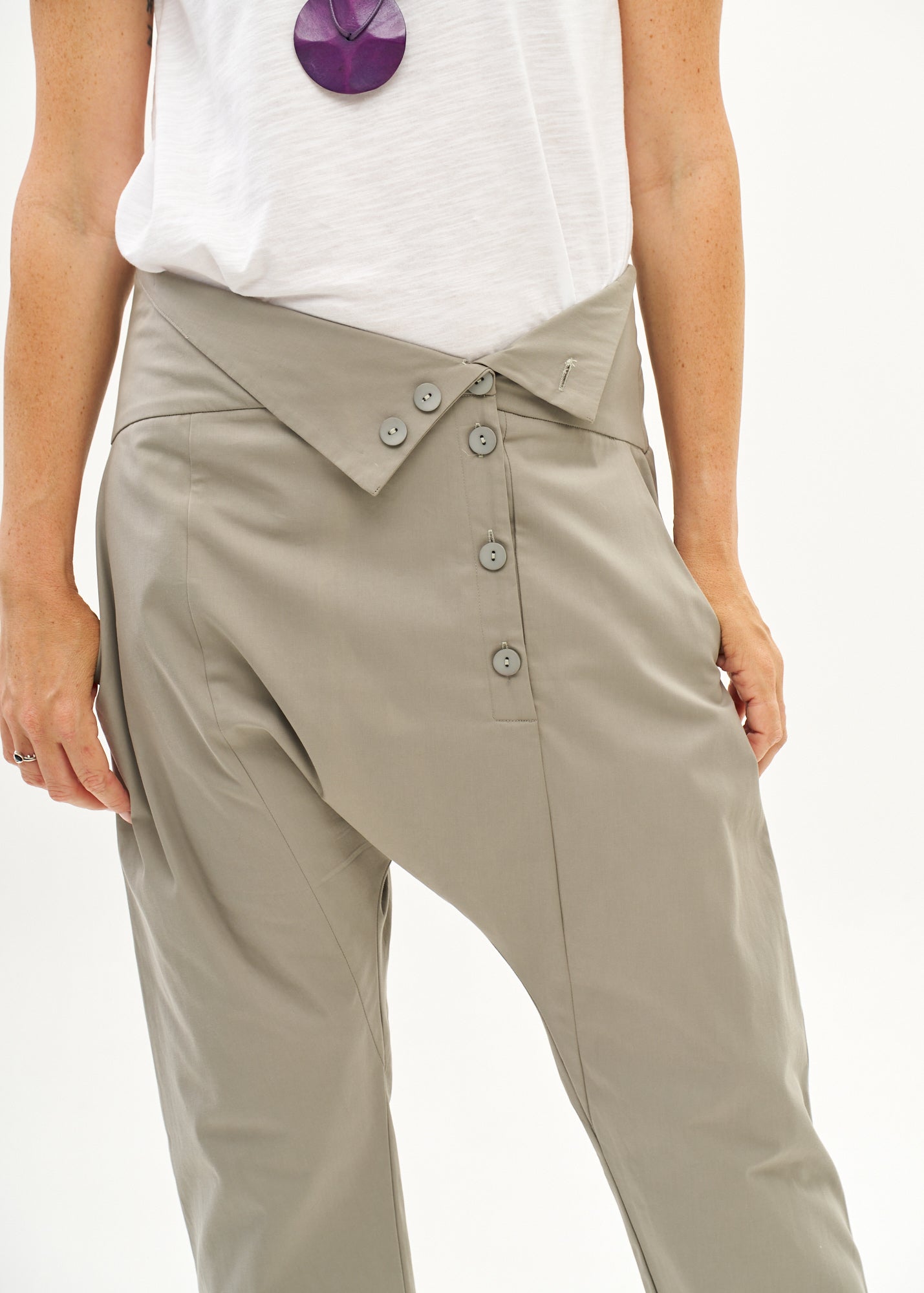 Green buttoned pants with folded belt