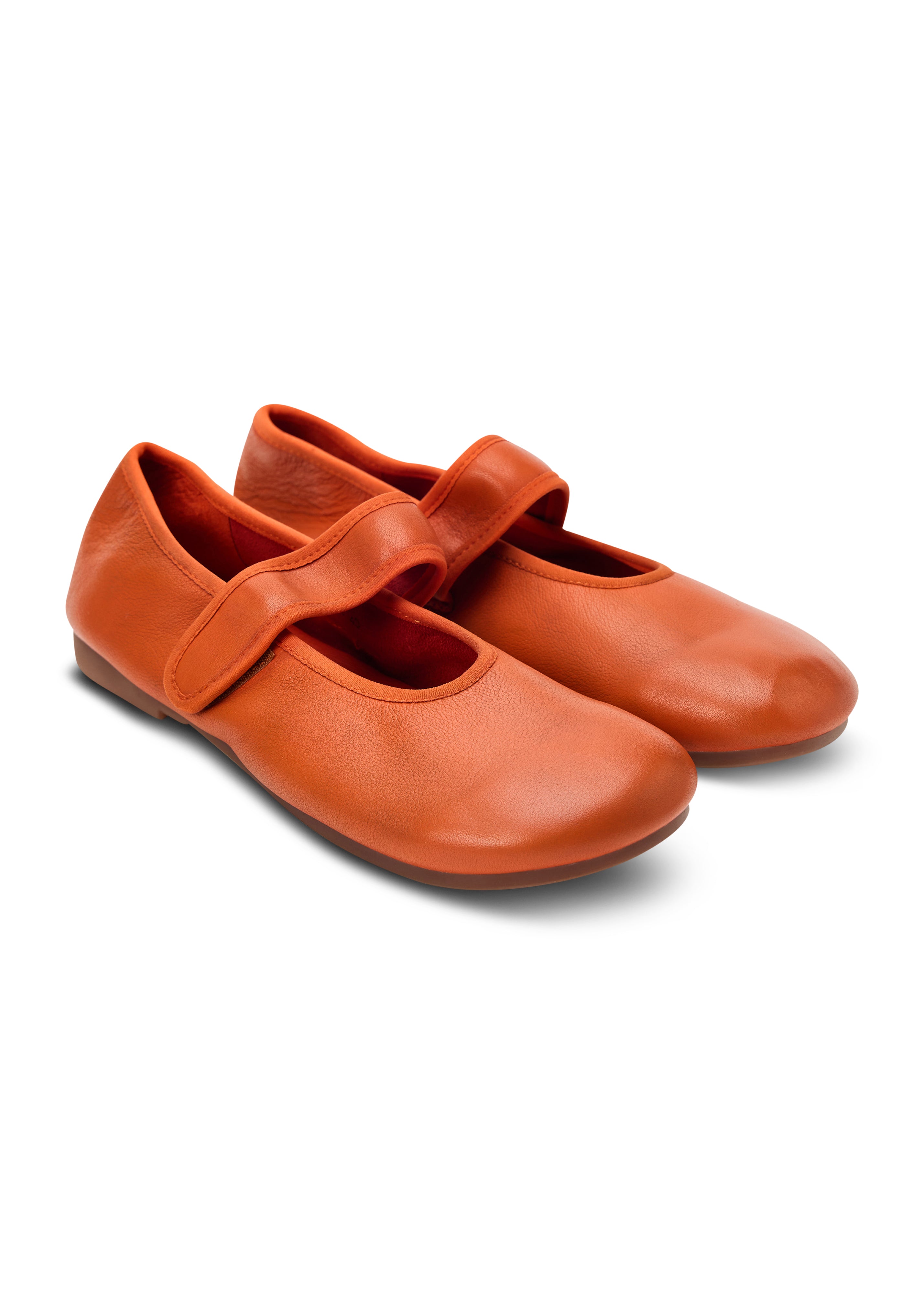 Ballet flats with an orange strap across the top
