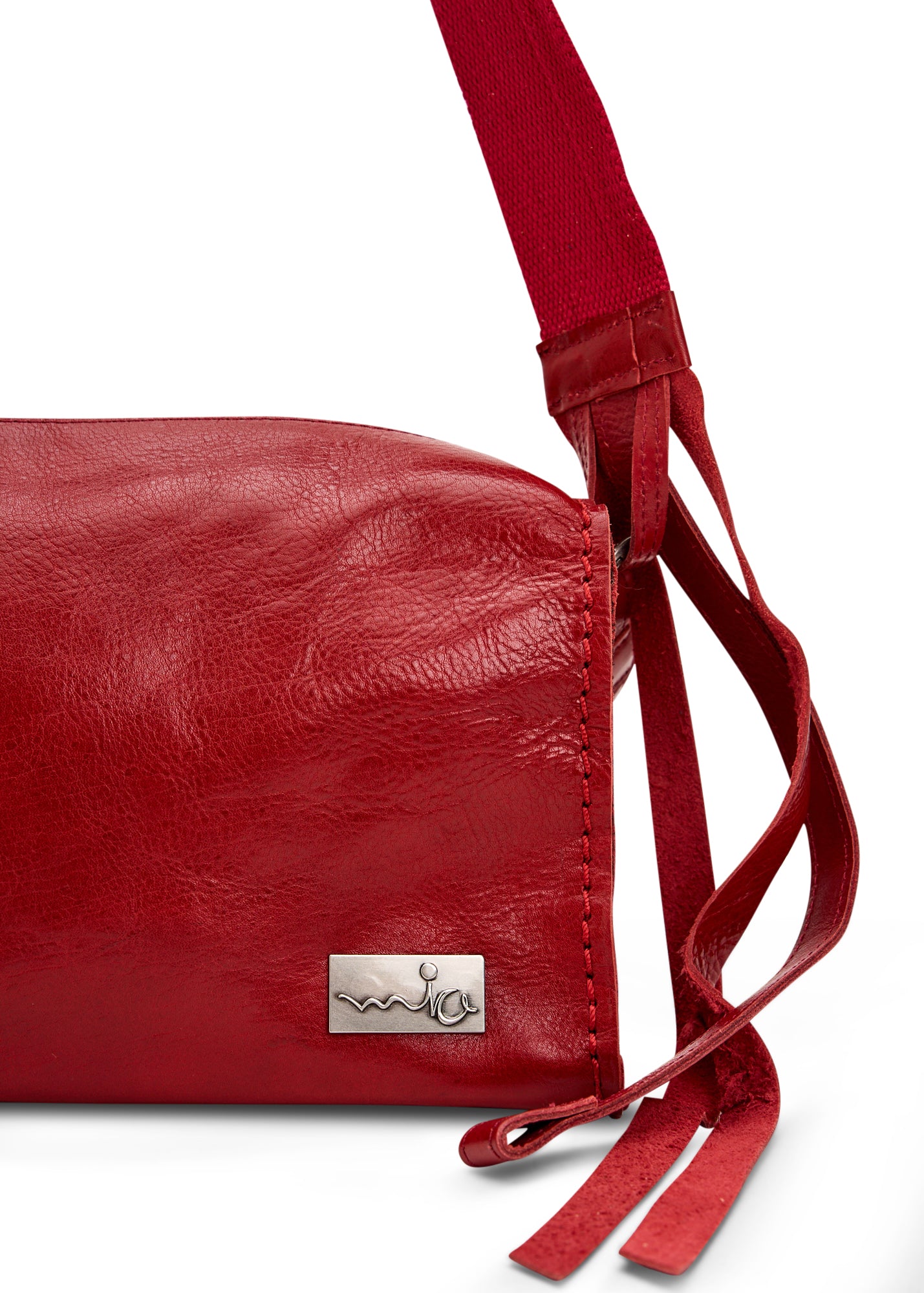 Rectangular leather bag with adjustable strap, red