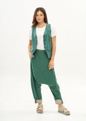 Green vest with angled pockets and tie-back