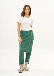 Green trousers with pleats, color combination, fold at the hem