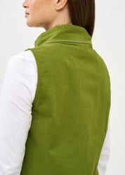 Green asymmetrical vest with prominent stitching