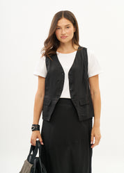 Vest with slanted pockets and a tie-back in black
