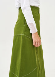 Asymmetrical cut skirt with prominent stitching in green