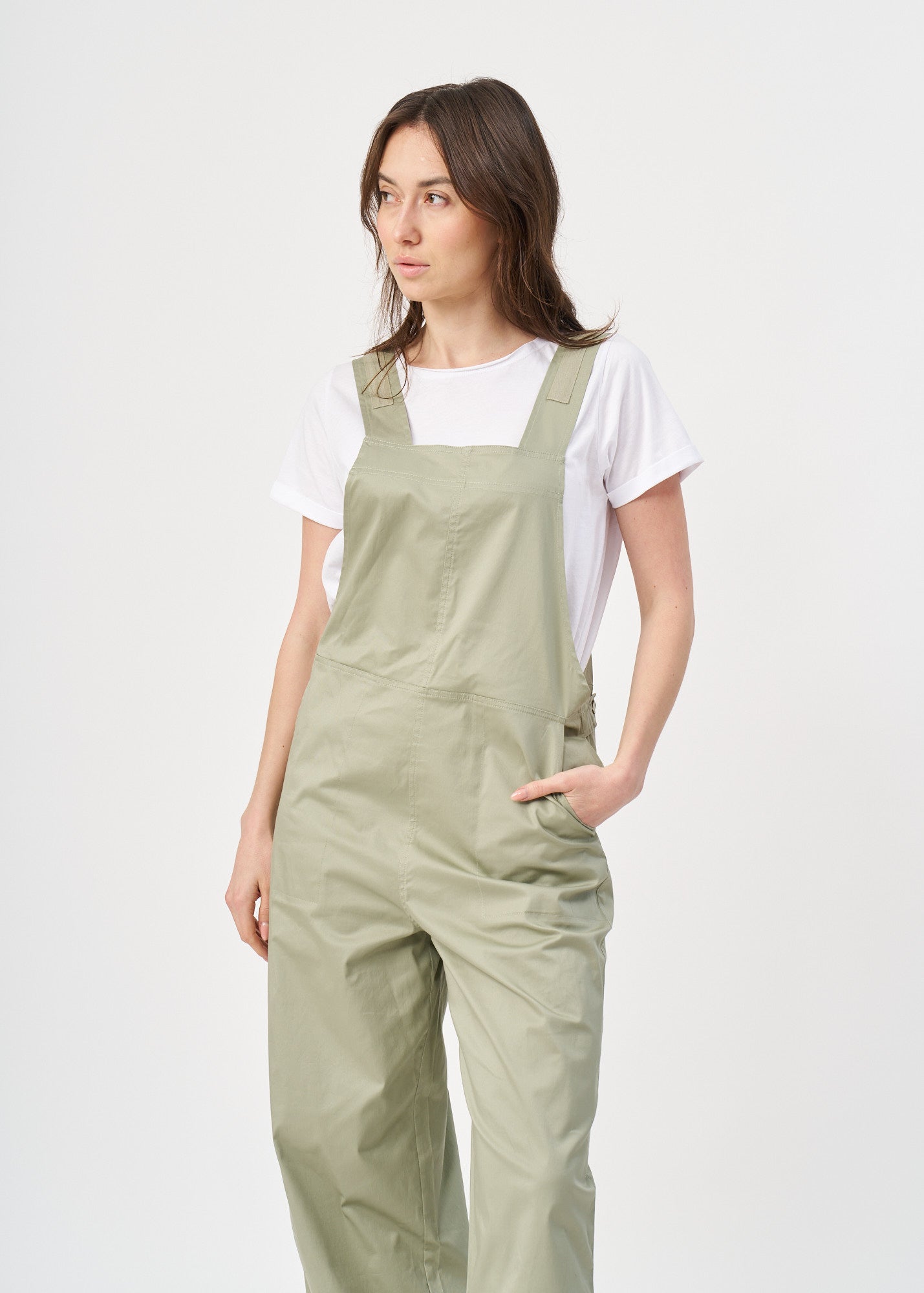 Suspender jumpsuit with green ribbon
