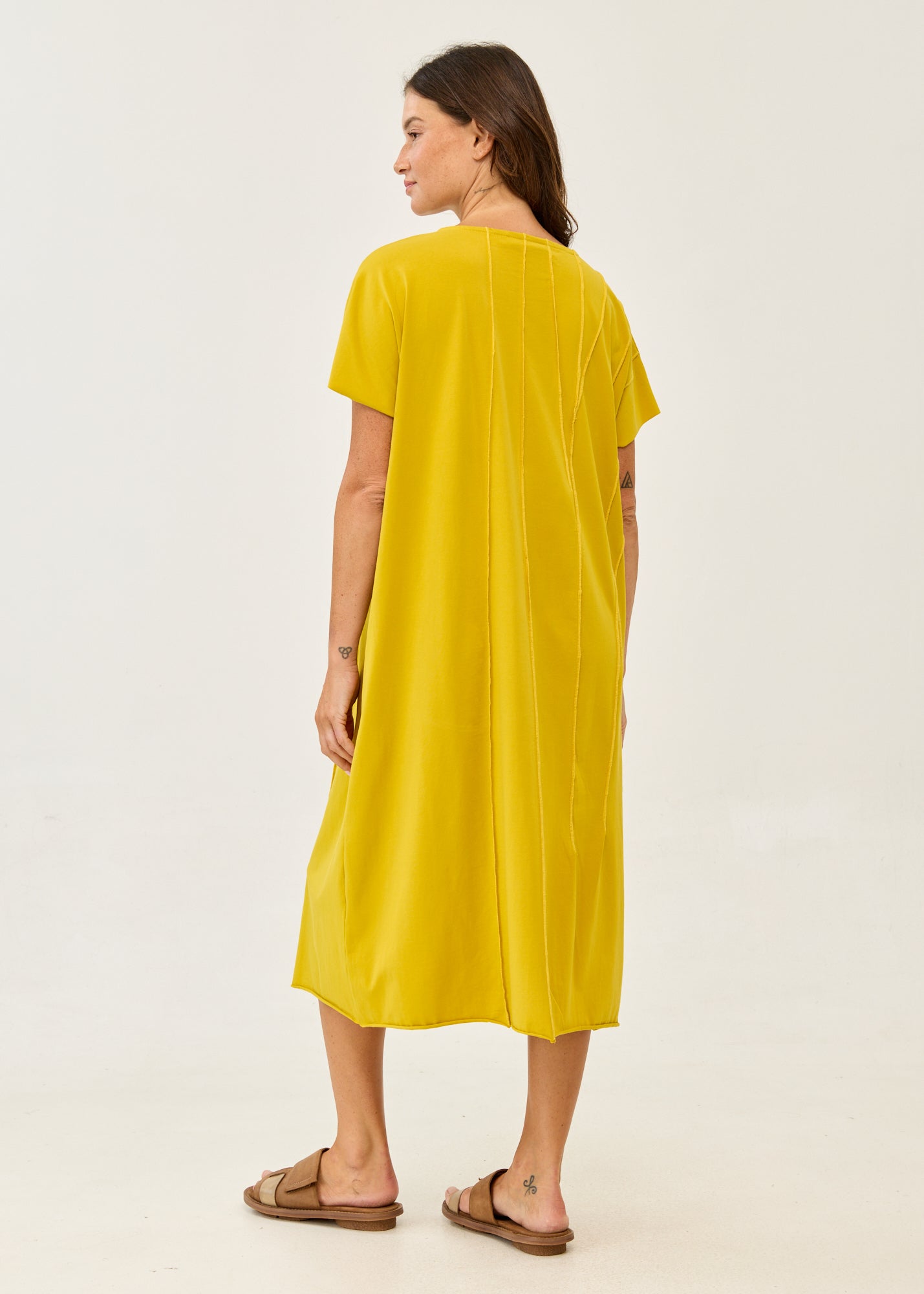 Mustard short-sleeve dress with prominent seams