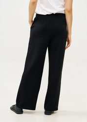 Wide pants made of soft black fabric