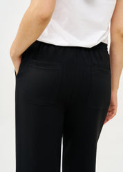 Wide pants made of soft black fabric