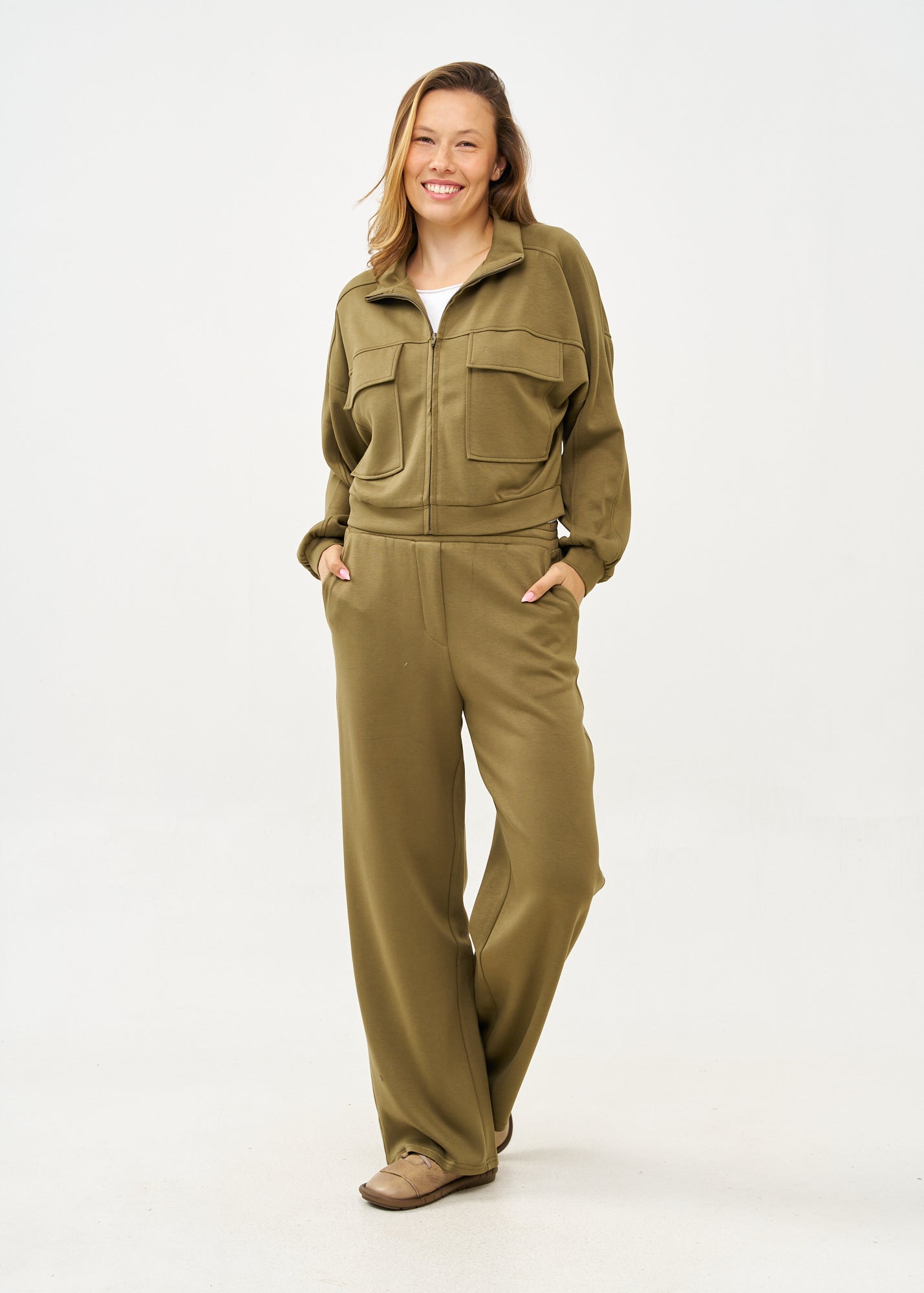 Wide pants made of soft green fabric