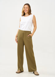 Wide pants made of soft green fabric