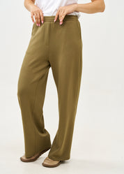 Wide pants made of soft green fabric