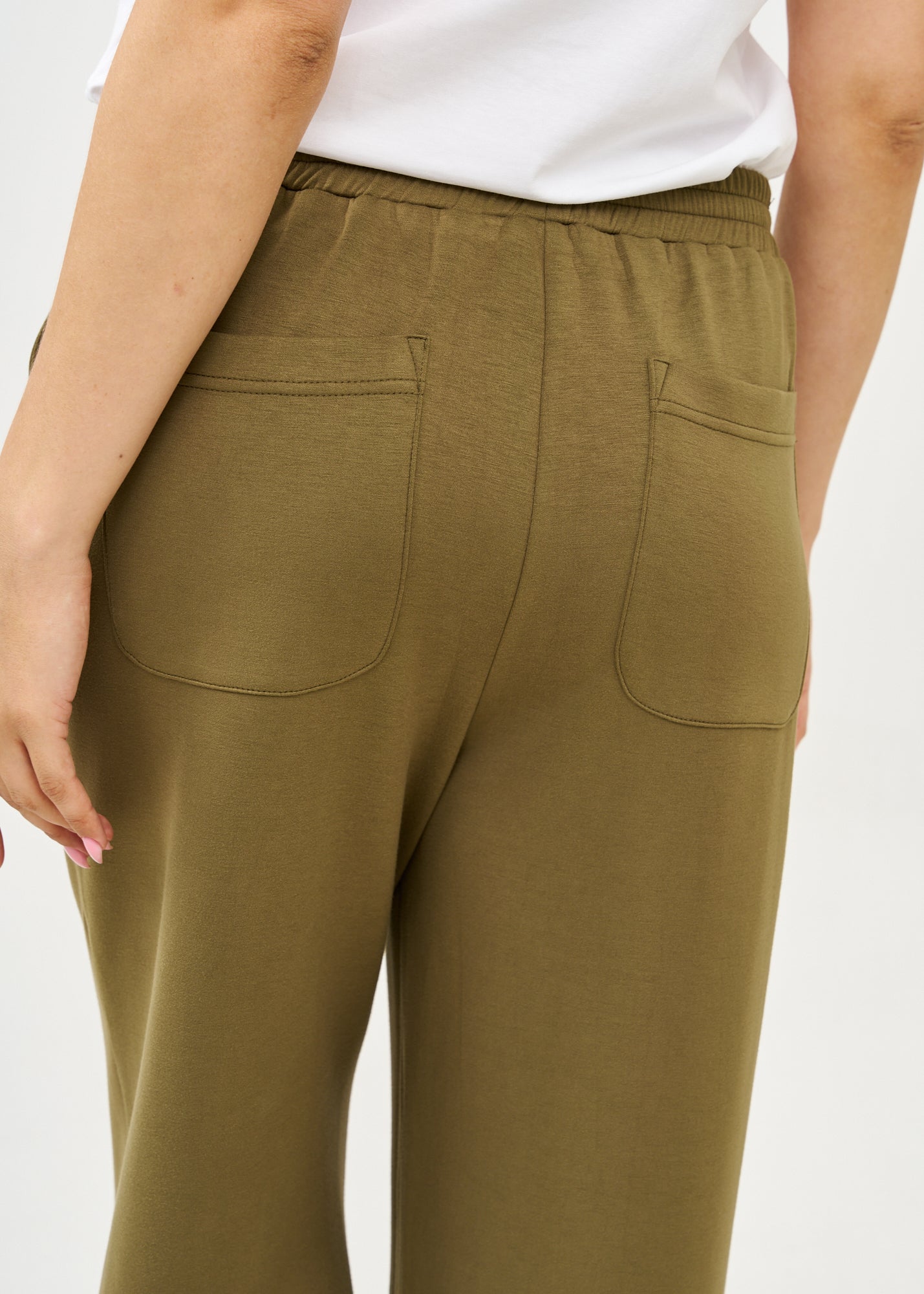 Wide pants made of soft green fabric