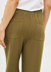 Wide pants made of soft green fabric