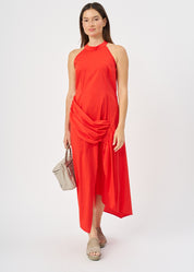 Halter neck dress with gathers and a red ribbon