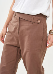 Long pants with brown diagonal belt