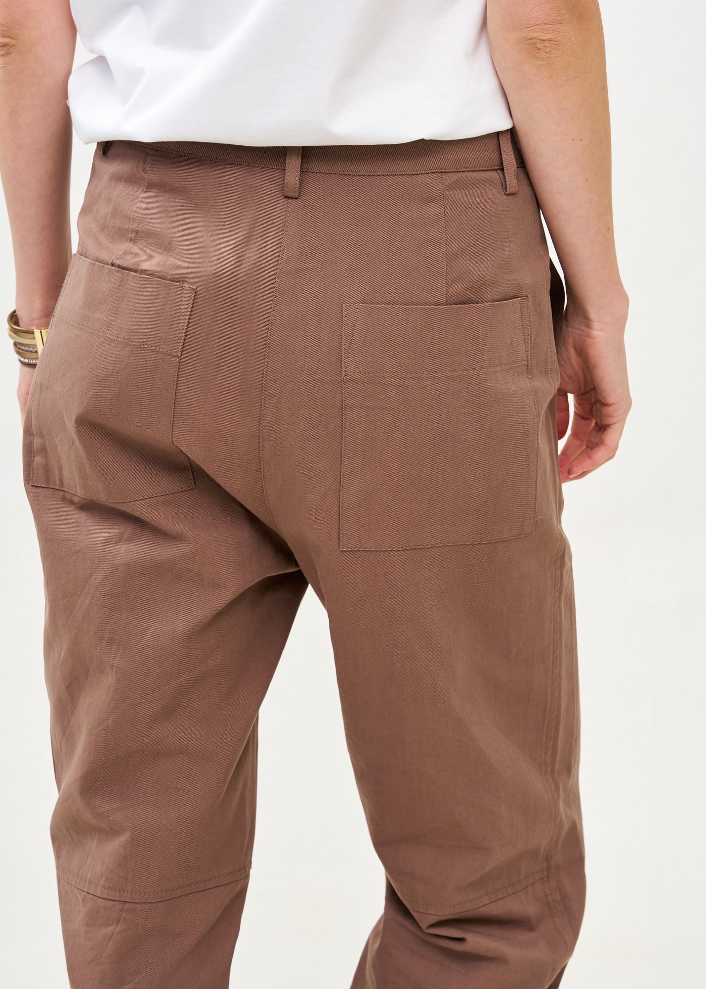 Long pants with brown diagonal belt