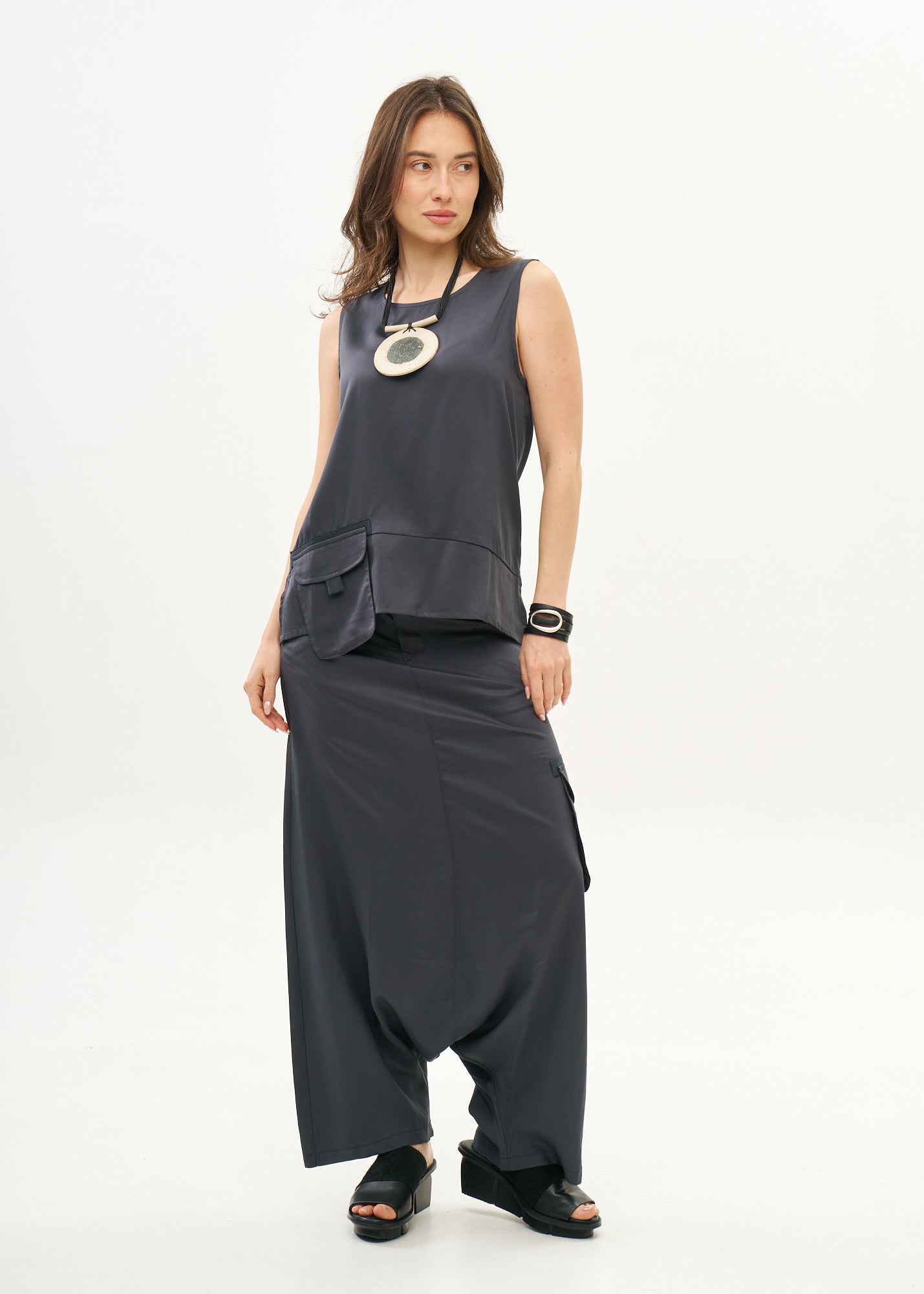Tank top with hanging pocket and dark gray ribbons