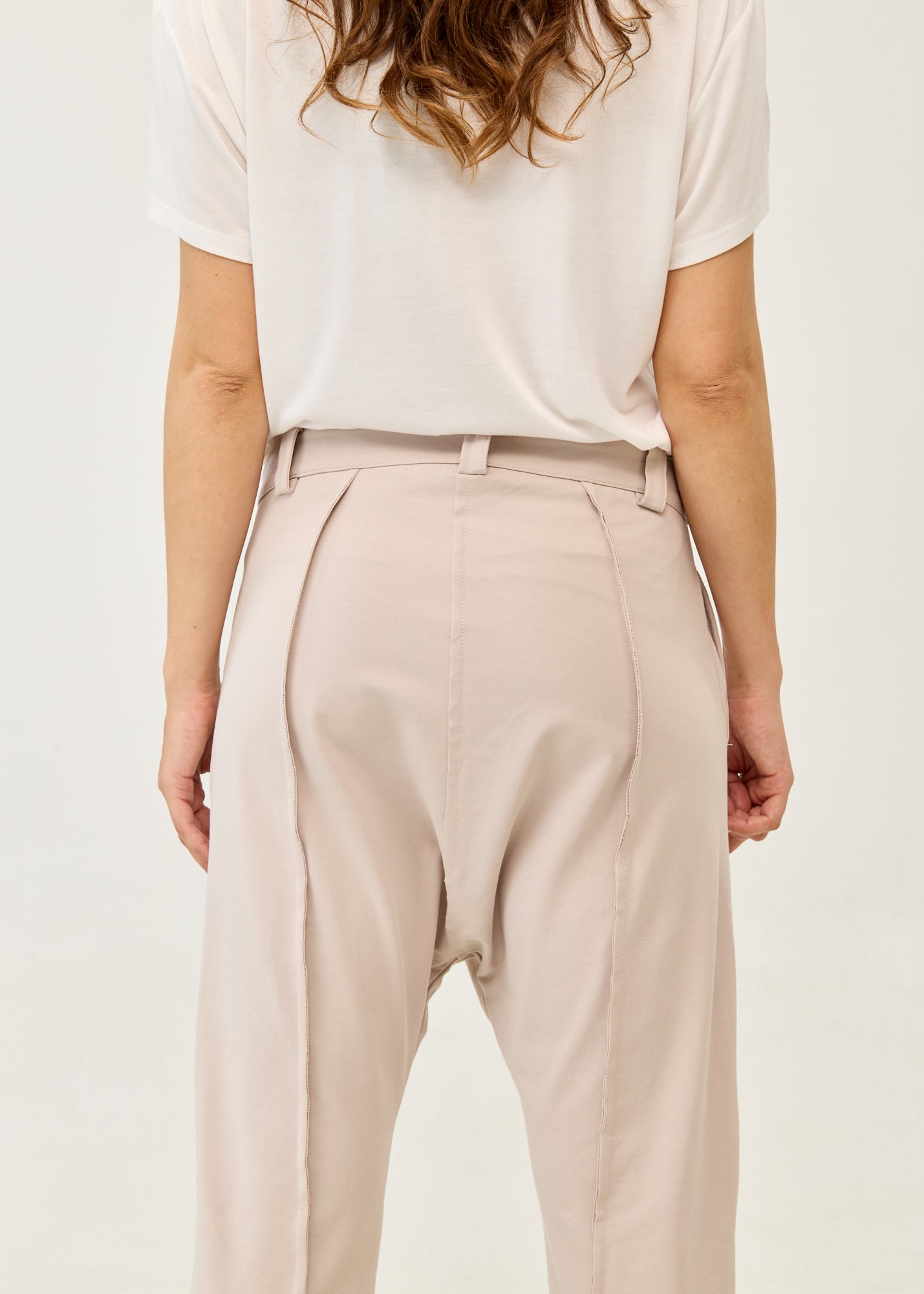 Pants with button and zipper cutouts, Stone