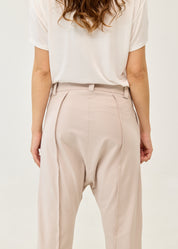 Pants with button and zipper cutouts, Stone