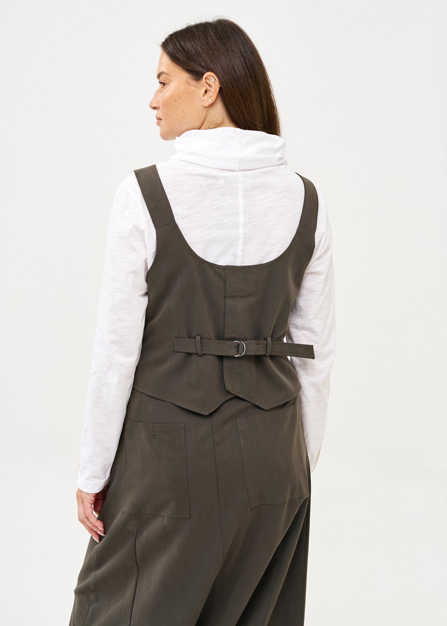 Dark gray buckled suspender vest