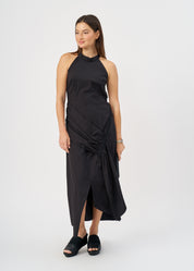 Halter neck dress with gathers and a black ribbon