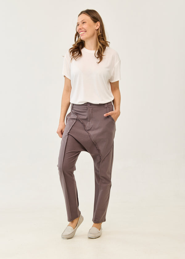 Dark gray pants with button and zipper cut-outs