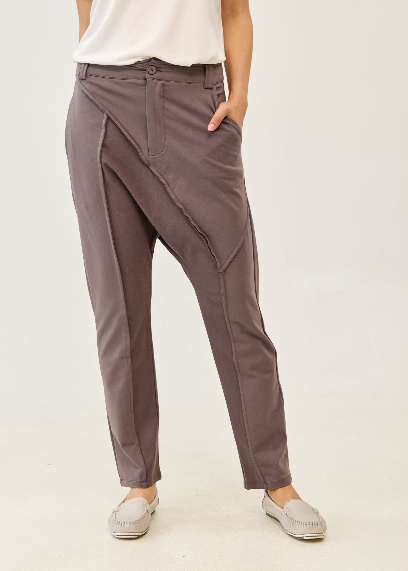 Dark gray pants with button and zipper cut-outs