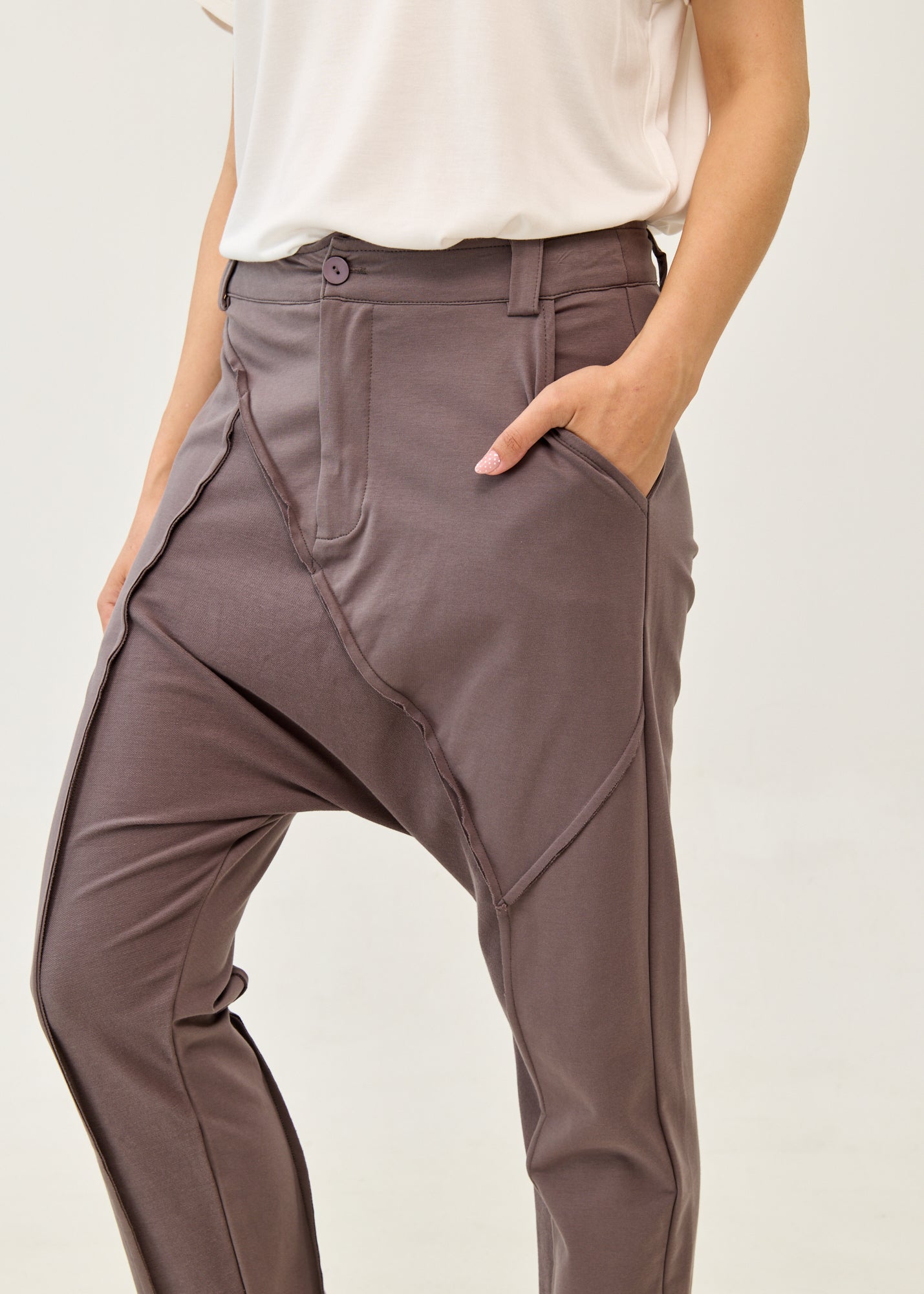 Dark gray pants with button and zipper cut-outs
