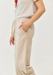 Pants with seams and elastic at the top, Stone