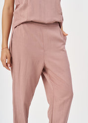 Pleated twill fabric pants with pink hem