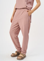 Pleated twill fabric pants with pink hem