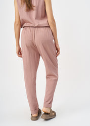 Pleated twill fabric pants with pink hem