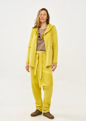 Reverse cut baggy pants with mustard belt