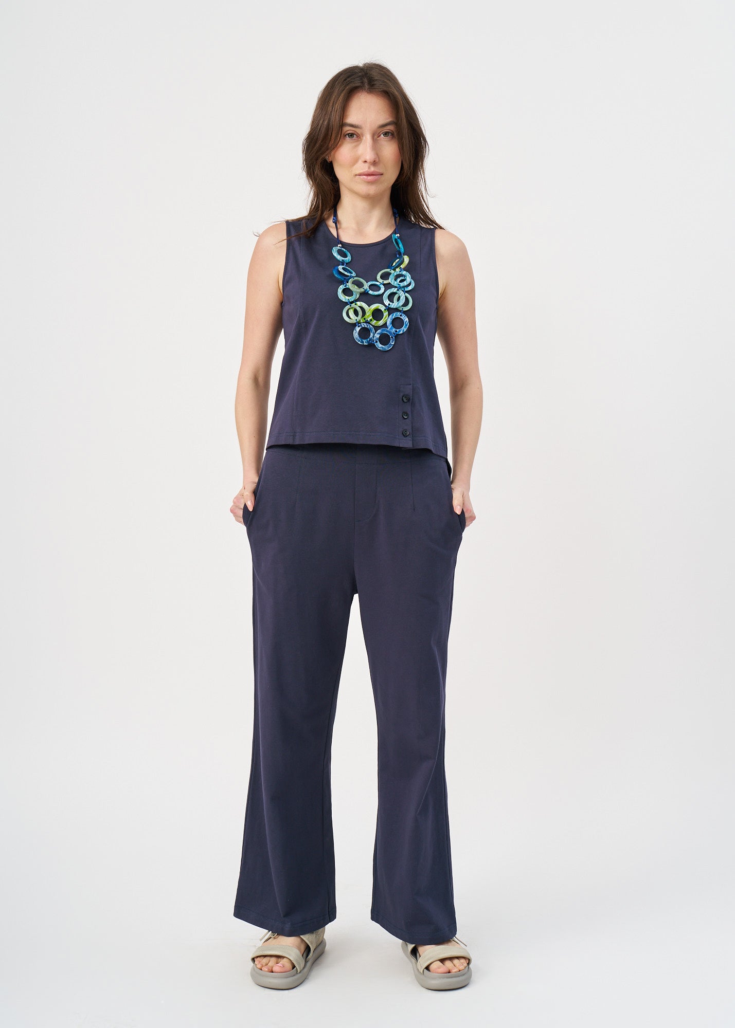 Blue jersey tank top with slit in the hem