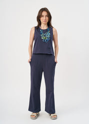 Blue jersey tank top with slit in the hem