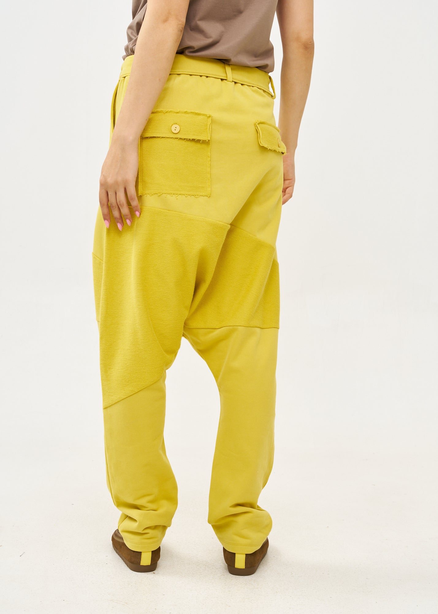 Reverse cut baggy pants with mustard belt