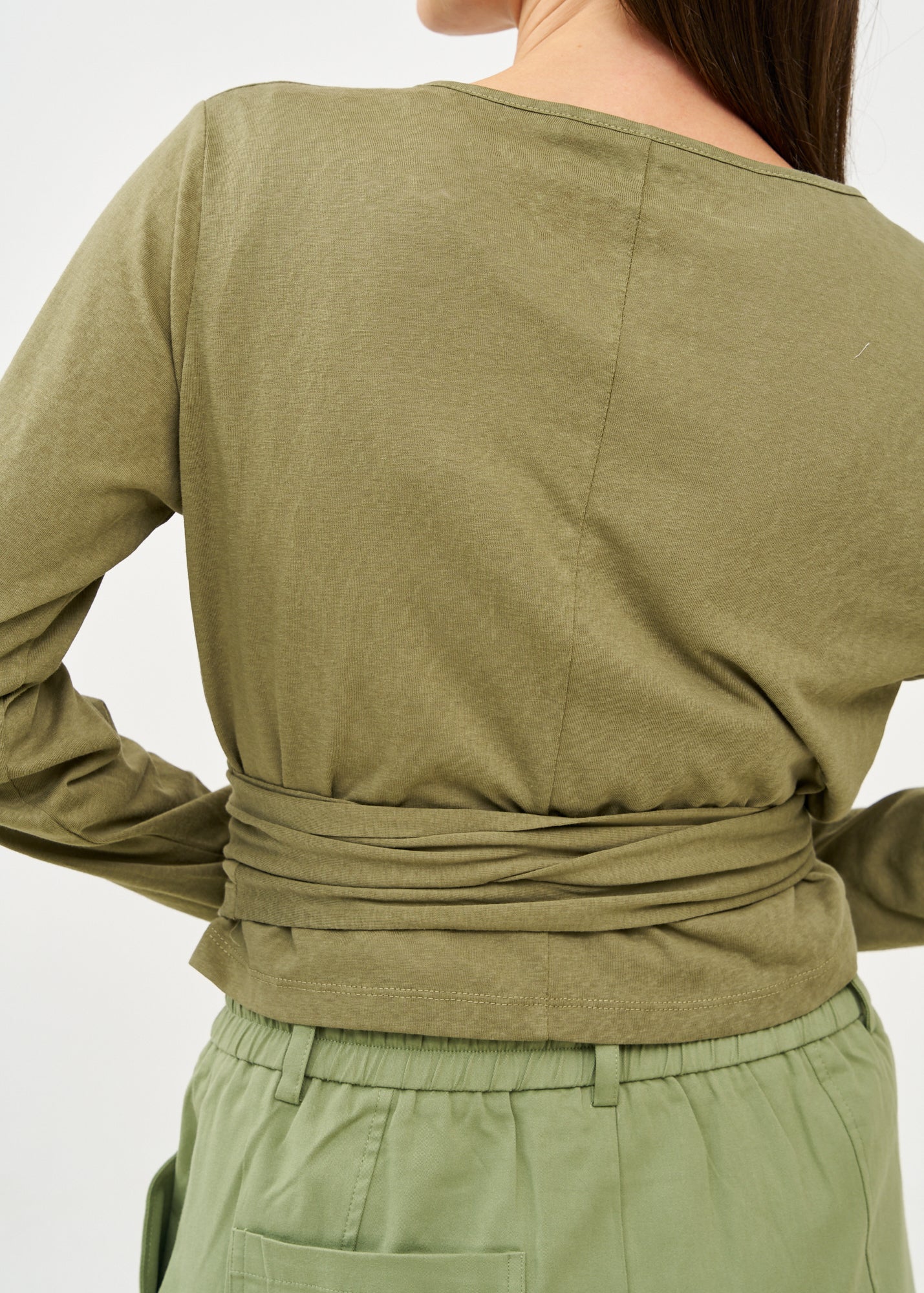 Green long sleeve tie-waist top