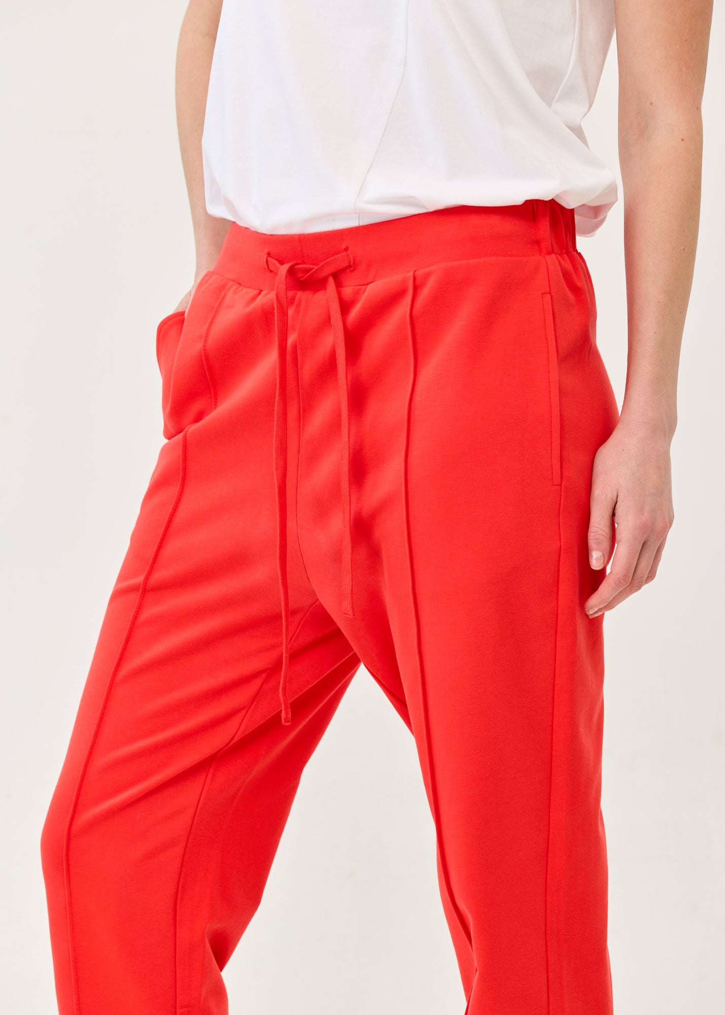 Pants with a seam in the middle and a red patch