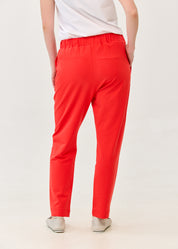 Pants with a seam in the middle and a red patch