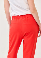 Pants with a seam in the middle and a red patch