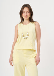 Yellow jersey tank top with slit at the hem