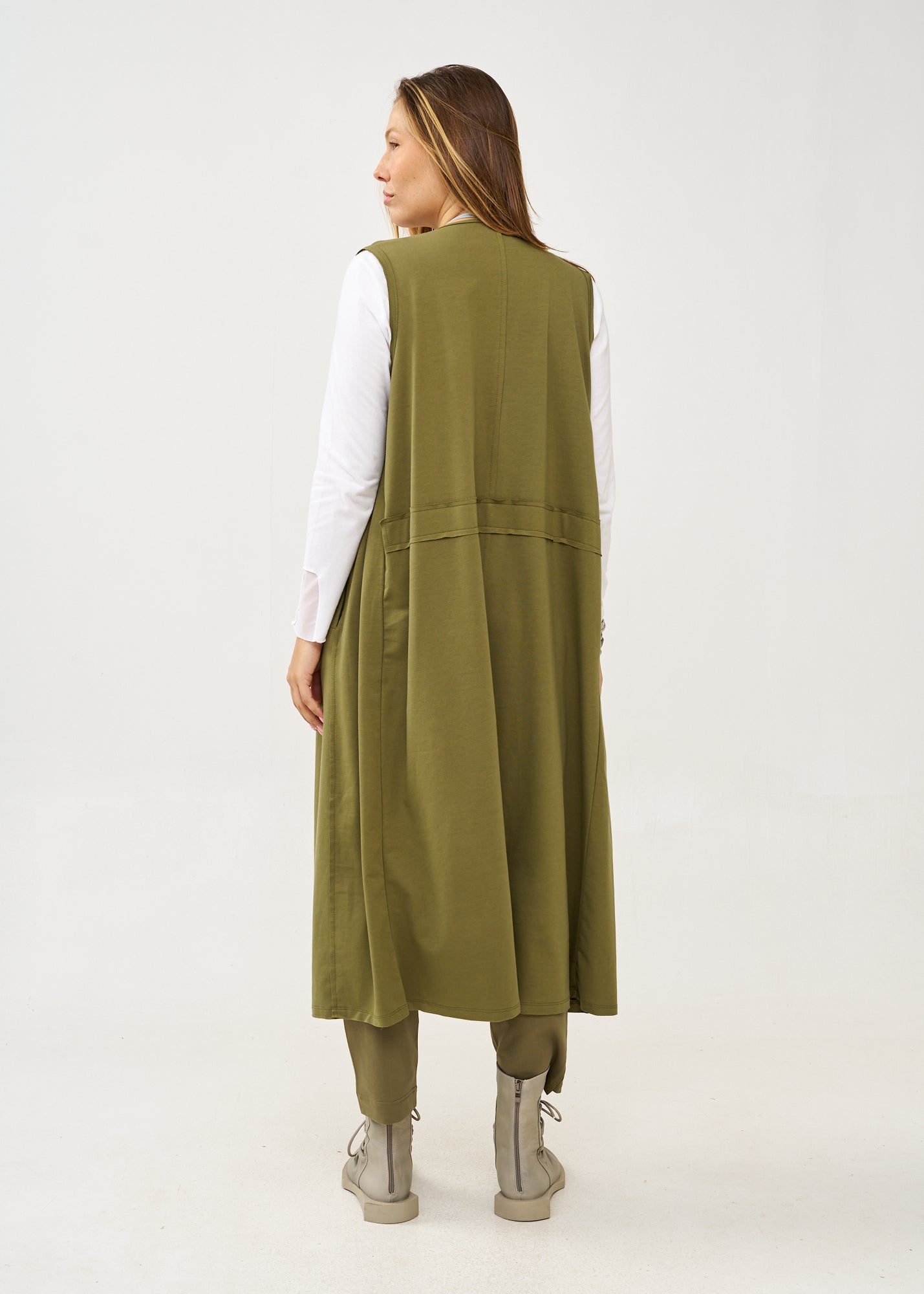 Long sleeveless top with green drawstring