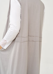 Long sleeveless top with light gray drawstring