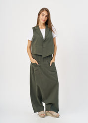 Dark green asymmetrical extension vest