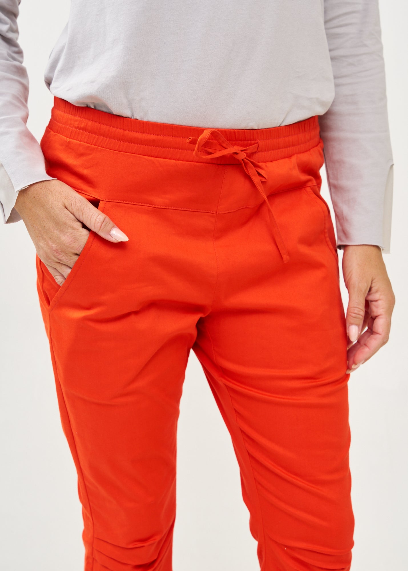 Orange knee-length pants
