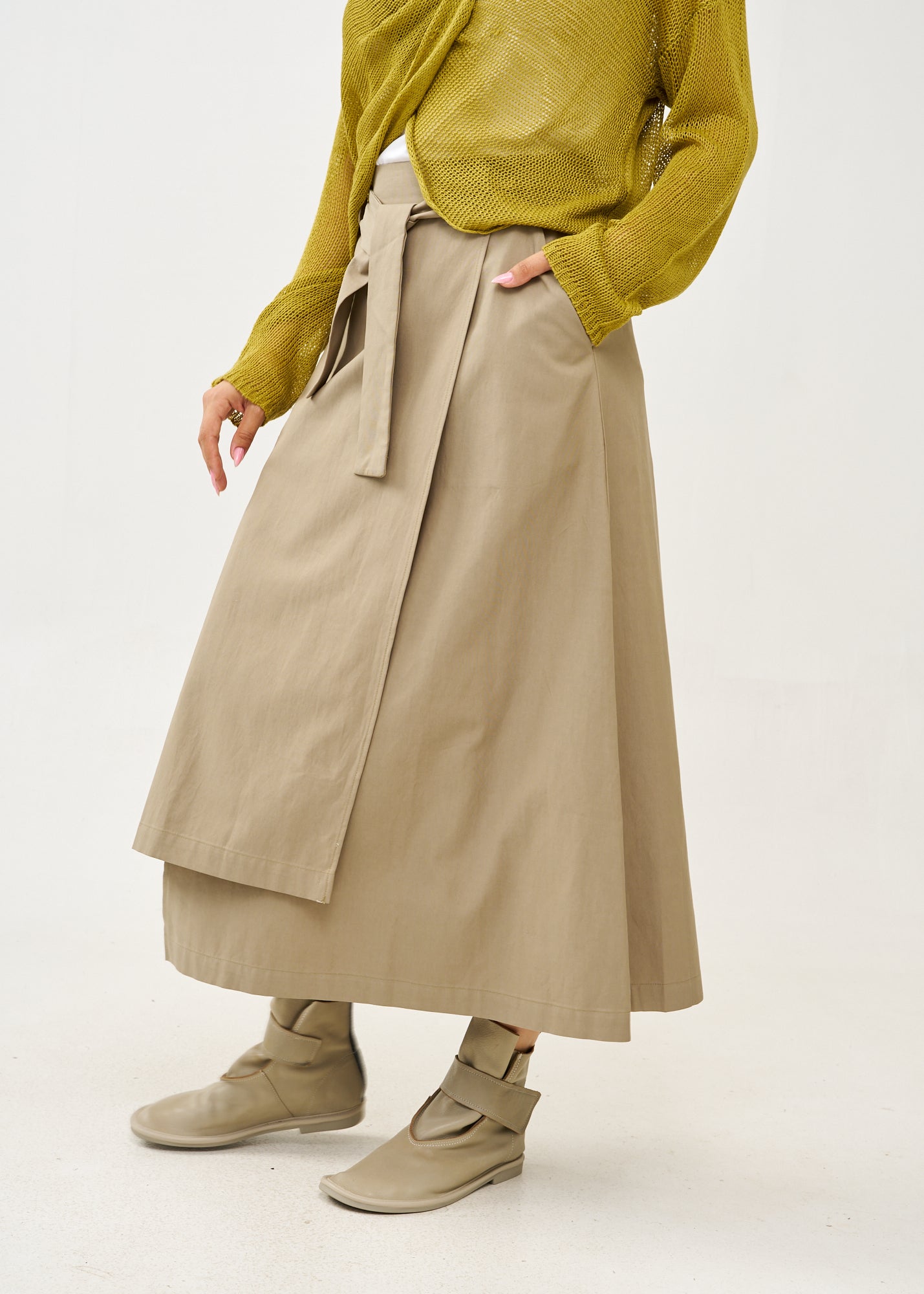 Asymmetrical wrap skirt with brown belt