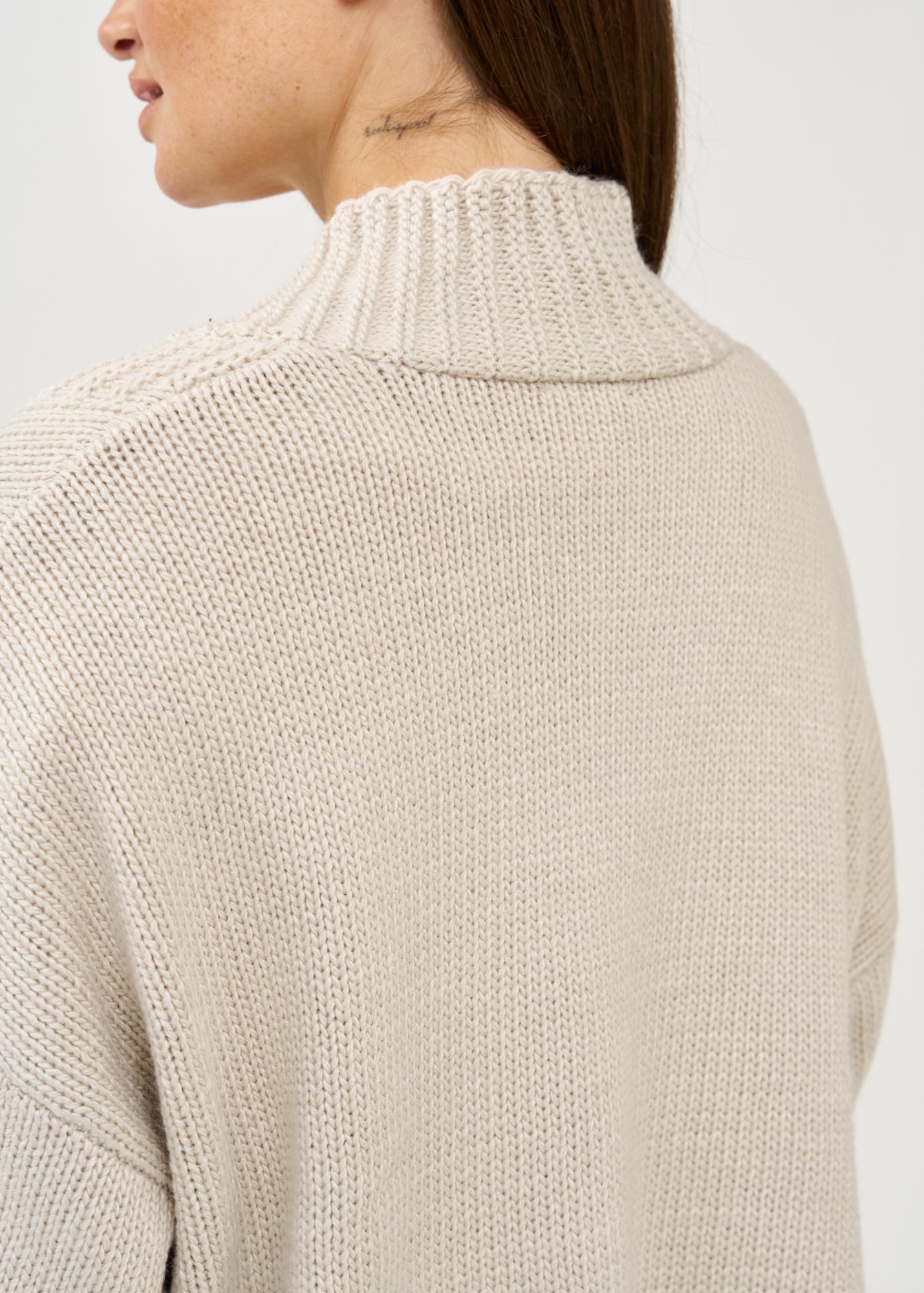 Light gray knit top with zipper
