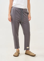 Pants with a seam in the middle and a dark gray patch